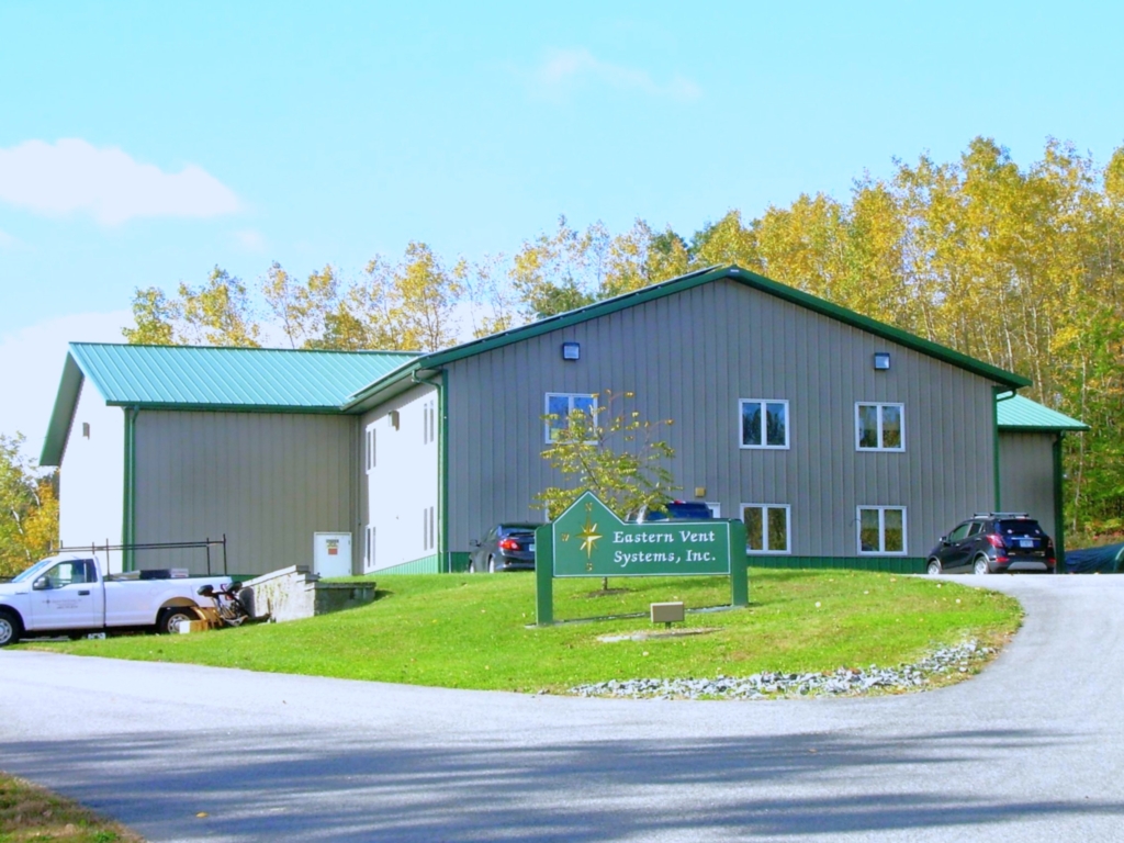 Exterior view of the Eastern Vent Systems commercial HVAC facility on Dick Tracy Drive in Pelham, New Hampshire.
